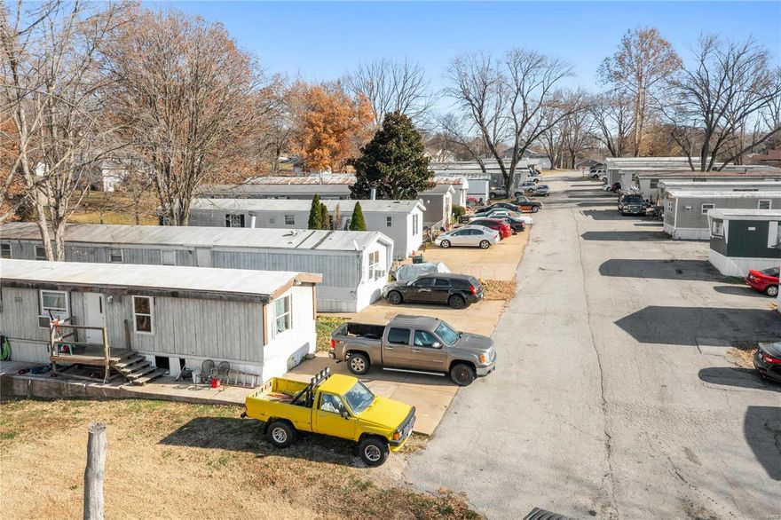 Well-maintained mostly-occupied 22-pad mobile home park on approximately 5 acres in a great suburban location surrounded by single-family homes and lots of green space. Public sewer system was replaced in 2017 and water is also on public! Pads/mobile homes rent quickly and have low operating costs. 5 tenants on HUD leases for guaranteed rent with the remaining being a mix of rent to own reducing maintenance costs for owner and park owned. All tenants are on leases. Also included is a large three-bay garage and a large storage shed. The park is well kept and will cash flow immediately!