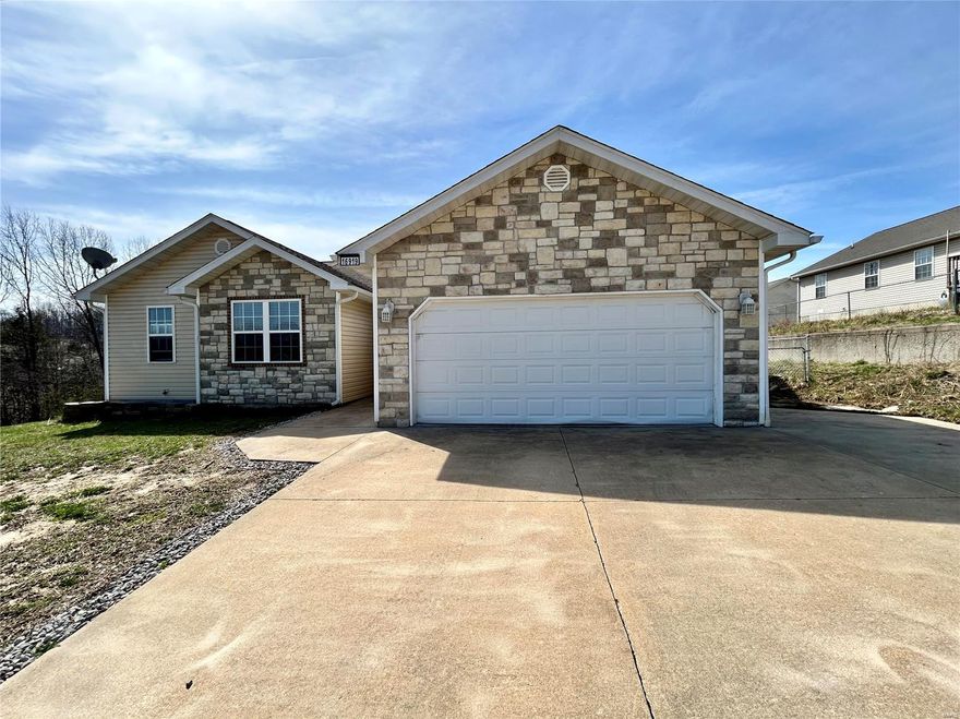 CUTE! CUTE! CUTE! This adorable 3 bed/2 bath ranch boasts of modern white kitchen cabinets with a subway tile backsplash, plus stainless appliances and an updated faucet. The living room has a cozy gas fireplace for those chilly evenings and easy to clean vinyl plank flooring. The master bedroom, with its vaulted ceiling, is large and features a walk in closet and a spa-like master bathroom with a jetted tub and separate shower.  Newer vanity provides dual sinks and updated lighting fixtures. This home is only about 10 minutes from the main gate of Ft. Leonard wood and close to shopping and restaurants! Get that country vibe without the inconvenient drive of actually being in the country! Chicken coop and chickens will stay (if you don't want the chickens, let us know).  Either way, enjoy the outdoors in this large fenced yard with your pets and littles! Are you ready to make this your next home?