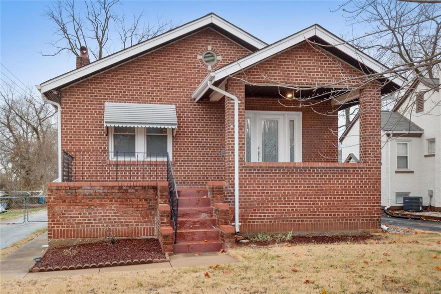 Old world charm meets modern convenience in this lovingly maintained all brick bungalow. Beautiful original woodwork inside and out--wainscotted exterior soffits, wood window frames and baseboards. Solid paneled doors with antique glass doorknobs. The kitchen has been updated with custom oak cabinets, all appliances are included in the sale. The primary bedroom is spacious and features pretty hardwood floors, while the additional bedroom has pillowy carpet and several windows filling the room with light.  There are two finished rooms in the basement--the larger makes the perfect recreation room or workspace, and the second makes the perfect bonus/sleeping room.  There is plentiful off-street parking with a 2-car detached garage, extra long driveway and additional parking pad. Updated systems include newer AC, tankless electric water heater, PVC plumbing stack, 200 amp electric panel, and generator. Roof 2008. Home to be sold "as-is." Seller will not provide any inspections or repairs.