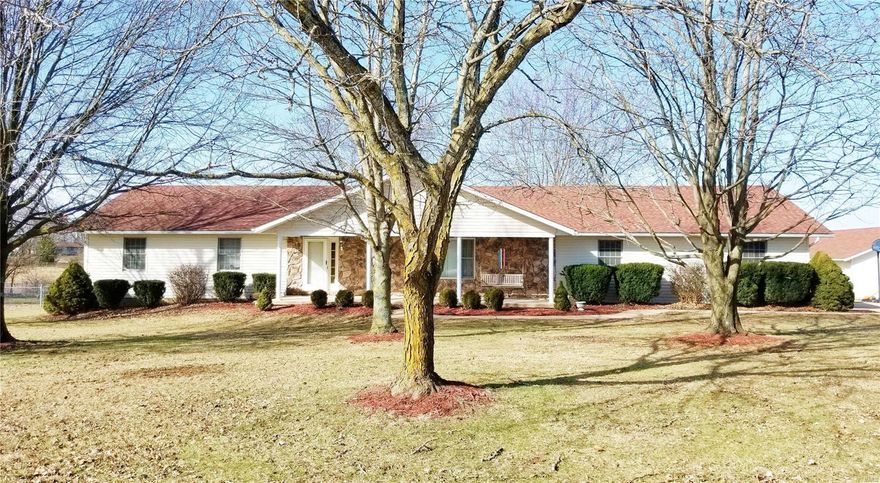 Get your kicks just off of Route 66!!!...and less than 5 minutes from HWY 44. Beautiful large move in ready ranch home on over an acre lot. The living room will accommodate all your big comfortable furniture and family gatherings. The combined kitchen and dining room is separated by a kitchen bar that is perfect for 4 bar stools, complete with 2 kitchen pantries. The second bathroom is combined with the laundry room. Attached oversized Garage. The home has 3 comfortable sized bedrooms with a huge master bedroom with walk-in closet. All bedroom closets have custom shelving. Large hall bath with linen closet. French doors exit the dining room to a pleasant screened-in porch with door accessing the fenced back yard. Plenty of shade trees in front and back. The play set stays. The over-sized detached garage offers all kinds of extra storage and workshop space.