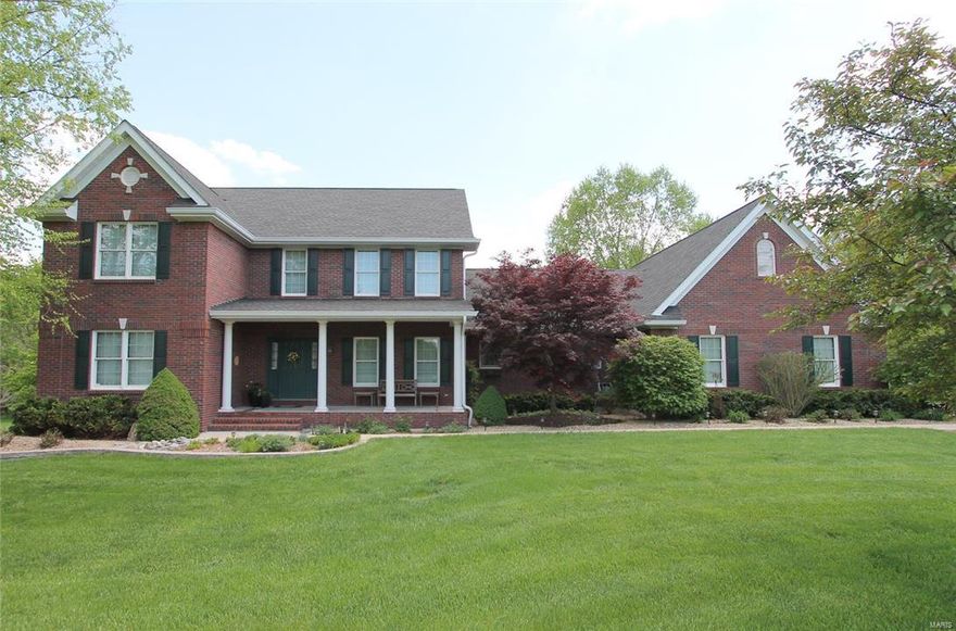 Gorgeous setting from the red barn as you enter the subdivision to mature trees. Farm like setting offers a home that looks right in place. Quiet and peaceful but just minutes from shopping, dining, schools & more. Wonderful brick elevation, energy efficient geo thermal. Main level master suite (huge walk in closet) luxury bath, custom vanity, whirlpool tub, tile, sep shower, water closet & linen closet. Plus a secondary main level nursery/music rm or home office. 2nd 1/2 bath on the main level The soaring two story great rm wall of windows with a view of the woods/trees, patio & inground pool. Kitchen/breakfast rm offers tons of cabinet space, upscale new (April 2016) counter tops, cooks/service bath. Formal dining rm freshly painted, crown molding. 3 well sized bedrms on upper level. Common bath with dual sinks. Main floor laundry rm w/cabinets & folding area. Walk out LL. Home office plus rec rm and 1/2 bath 3 car oversized garage (extra wide & deep).  2.82 acre park like level lot