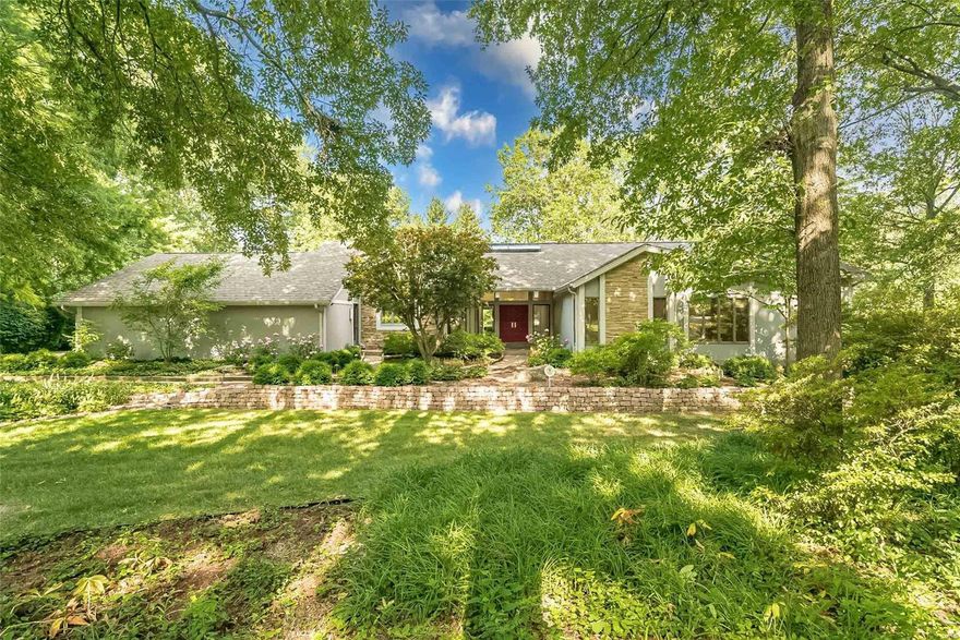 One of a kind contemporary situated on quiet acre lot in highly desirable Frontenac Woods & Ladue Schools. Original 4 bedroom plan being used as 3 plus office. You will be welcomed by the botanical garden like front yard & aggregate walk leading to the entry gallery w an 18’ long skylight. Take your time to appreciate the high quality finishes & detail throughout including amazing ceilings & stone see-through fireplace w 360 degree smooth stone hearth. To die for kitchen featuring Downsview cabinetry, immense center island w prep sink, Wolf & SubZero appliances plus 2 Asko dishwashers will far exceed the gourmet cook’s expectations. Master suite is a luxury retreat w cabinetry of mahogany w granite tops & 18X16 spa like bath featuring Jerusalem gold limestone & special Earth Wind and Sea Ultrglas enclosures which are only the beginning. Powder room & hall bath are also must sees. There is a finished LL, wine closet w large chiller, Zuri deck & 3 car oversized garage & the list goes on.