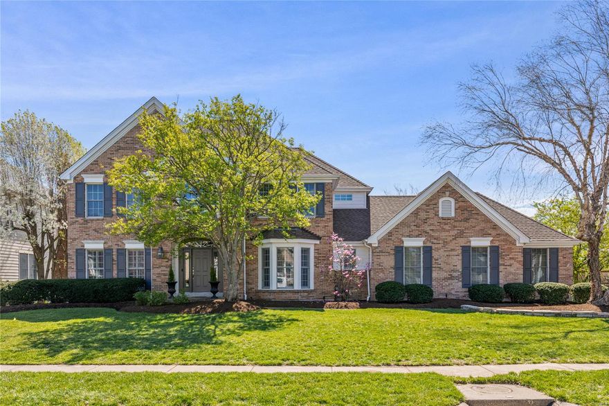 Classic-styled brick 2 Sty in prestigious Brook Hill Estates. This exceptional Fischer & Frichtel-built home features 4382 sf of living space enhanced by wide plank flooring, detailed trim work & plantation shutters. Impressive 2-sty entry foyer leads to private study, formal dining room and spectacular family room with wide bay window & brick fireplace. Designer kitchen with 42” black Shaker cabinetry, quartz countertops, stainless steel appliances & 7’ center island adjoins light-filled breakfast room with wine bar and vaulted sunroom. Coffered primary bedroom suite with customized walk-in closet & luxury bath with shower spa offers an appealing retreat. 3 Generous-sized additional bedrooms & hall full bath complete the 2nd floor living quarters. Lower Level entertainment space includes recreation room & gathering bar with wine cellar plus office & full bath. Atrium door opens to outdoor living area with resort style pool, patio & sun deck. Award-winning Parkway West School district. Additional Rooms: Sun Room, Wine Cellar