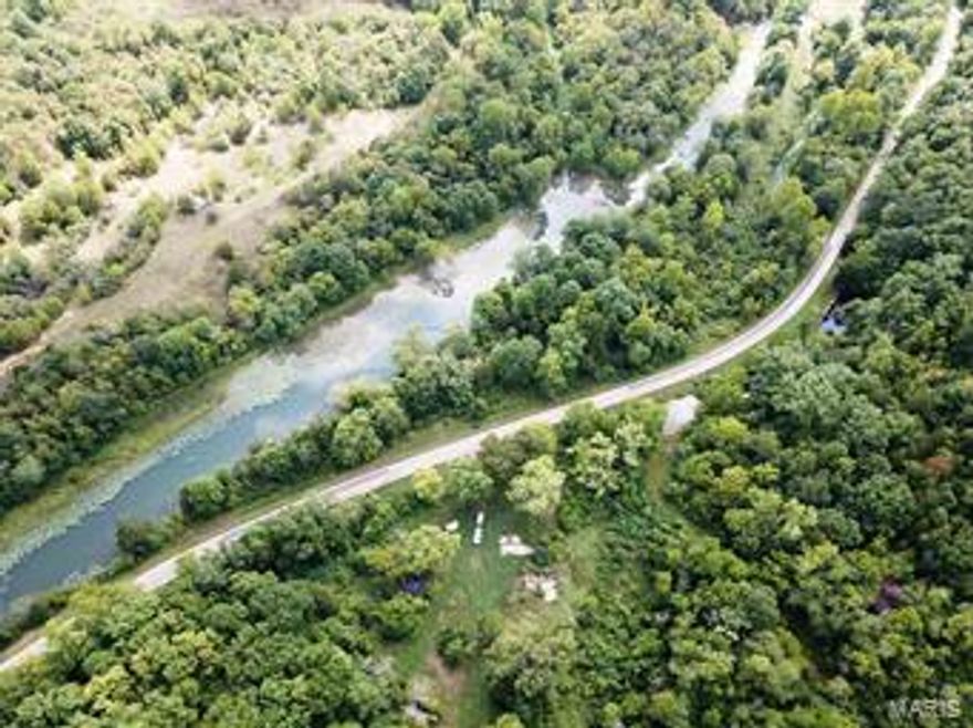 A river runs through it! Rare opportunity to own a huge parcel of the Ozarks! This gem full of natural Ozark wonders has plenty of live water. Take a drink from the infamous Bunyard Springs, which produces between 3.4 to 4.8 million gallons of fresh Ozark spring water a day, the once upon a time supported a fresh water trout farm. Float your cares down the river, as this property boasts almost 1.5 miles of river frontage on both sides of the upper Black River, providing endless opportunities for recreation.