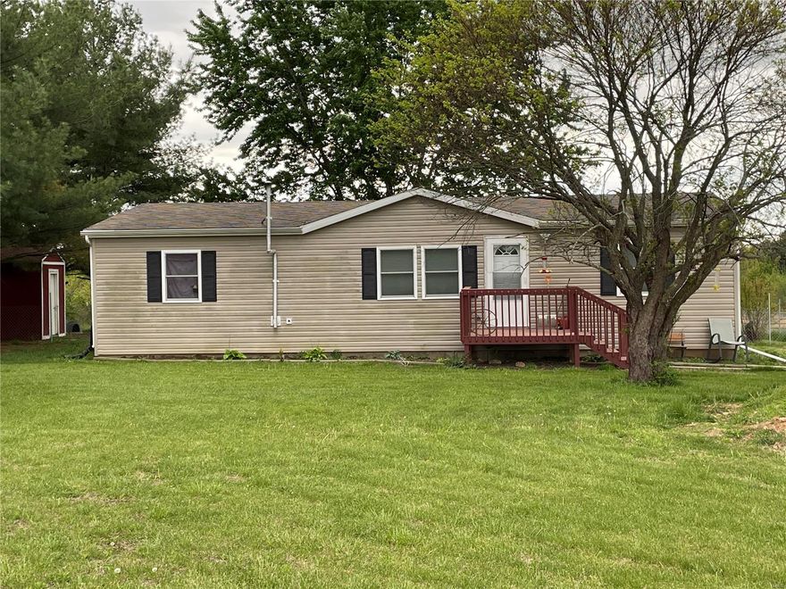 Nice mobile home on 5 acres right between Marshfield and Springfield giving you tons of shopping, fun, and restaurant options!