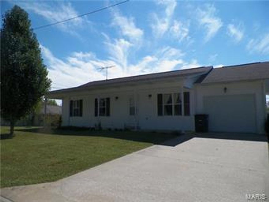 Nice and neat 3 bedroom, 2 bath home sitting on a large 83 x 112 level corner lot. Home is charming, and very well kept. All appliances stay including newer washer & dryer! Basement has rough-in plumbing for future expansion.  Chill on the spacious front porch, or nap on a hammock in the privacy of your fenced in back yard. This child and pet friendly home is USDA & FHA qualified!  Call and set up your viewing today!