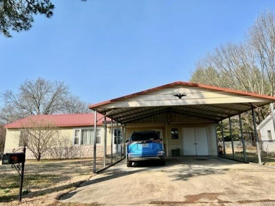 HOME-SHOP-LARGE LOT. Check out this maintenance free home with so much POTENTIAL! Home has been partially remodeled and ready for you to finish and make your own. Inside you will find two bedrooms and two bathrooms with a bonus room that would make a great master bedroom, family room, office space or anything you can imagine. Located on a large lot that connects to second road on the back side with an additional entrance that leads to the LARGE 50x30 shop/garage with concrete floor, electricity and two garage doors 16 ft and 10 ft. There is a breezeway that connects the house to the shop. There is also a storage room at the end of the home. Don't miss out on this gem that is PRICED TO SELL! It will not last long in this market.