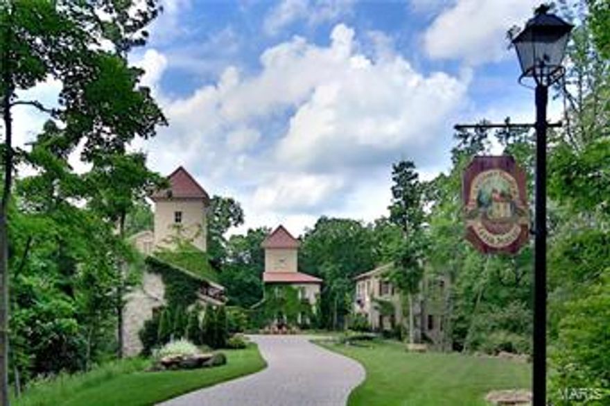 This imaginative Italian Village Estate is simply magnifico! Your private retreat nestled in & hidden at the end of a tree-lined lane. Seller is builder & can accommodate buyer's changes. Old World charm meets all the modern conveniences. Main house dazzles w/dramatic stone walls & fireplaces, slate, limestone & wide plank flooring, custom alder wood cabinetry,& covered terrace w/fifth fireplace. Clock tower is fun,fuctional & serves as a pub/card room & bath for Mediterranean style heated salt water pool. Carriage house boasts a separate apartment/guest house/office w/small kitchen & private bath. Master suite has a barrel vaulted ceiling, cove lighting, wall sconces, a 20'x10' master closet & a shower that has to be seen to be believed.  The estate has been featured on TV & in magazines for its innovative style & attention to detail.  Elan sound system, 10' baseboards, custom mill & iron work.  Third floor observation room offers breaktaking views. Use main house or more. Bella Casa!