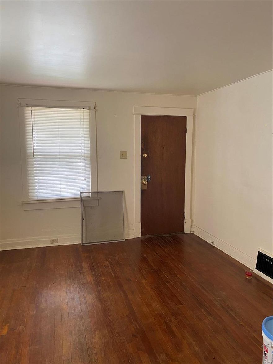 This could be a great first home opportunity with a little TLC or a possible rental investment. Rent ranges from $700-850 in this neighborhood. This cute brick bungalow offers original hard wood floors and unique charm that can't be recreated. All it needs is the right buyer with a little imagination to bring it to life! The home is being sold "AS IS".