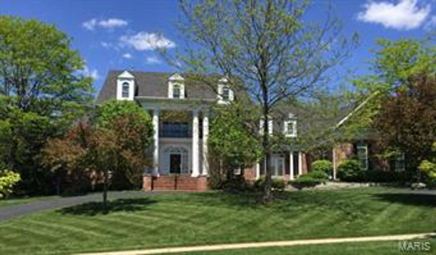 Click the movie reel for a 3d self guided tour!
This Johnson built home is one of a kind! The superior attention to detail, quality of crafmanship & design appeals to the discerning buyer. A marble foyer & 2 story great room catch your eye upon entering the home. Looking beyond one can see the private backyard pool, covered veranda, hillside waterfall/pond & custom landscaping. The kitchen boasts custom counter tops/custom cabinets & top of the line appliances and adjoins the breakfast room and step down hearth room complete w/ stone fireplace & built in shelving. Extensive millwork in the dining room, paneled study, wet bar w/ stained glass. Again, equisit millwork in the master suite with baywindow and luxury bath featuring heated marble floors & open shower. The walk out lower level has the same attention to detail with fitness room, play room, recreation room w/ built in bar, 2 BR and 2 full baths. The finishes throughout leave you dreaming to own this home. Additional Rooms: Mud Room