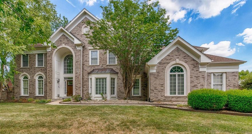 Minutes from restaurants, shopping, parks, and Hwy 40 sits this gorgeous 5 bed, 5 bath home offering over 5300 sq. ft. of living space in a sought-after Chesterfield neighborhood. Walk in to a beautiful 2-story foyer with extra-wide staircase. Large formal dining room connects to a bright and airy kitchen with a spacious, window-filled hearth room, and main-floor laundry. A sophisticated great room with special millwork, 2nd fireplace, and wet bar offers a luxurious way to spend your evenings. Continue to the home office equipped with a window nook. perfect for morning coffee. Upstairs greets you with a large master bedroom and beautifully-designed, updated master bathroom with heated floors and a huge walk-in closet. The lower level boasts a 2nd wet-bar, expansive theater room equipped with surround sound, and plenty of storage space. All of this is situated on a level, half-acre lot surrounded by mature trees. The famous phrase "location, location, location" has never rung so true!