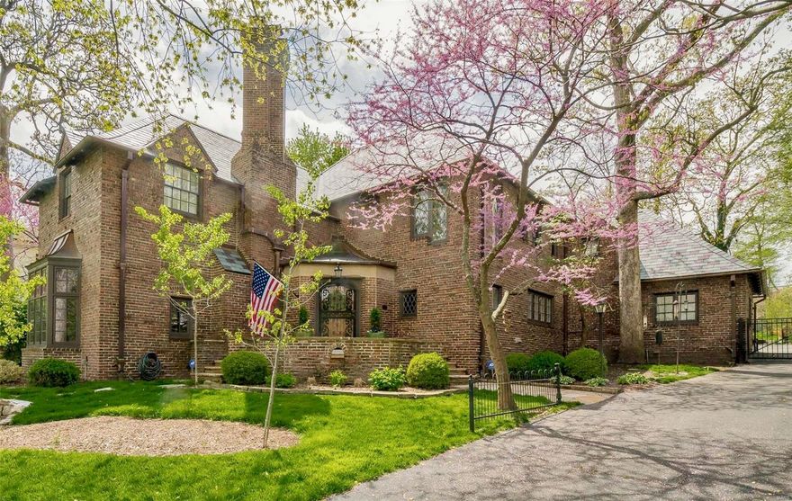 Sherwood Forest, Webster's most desired historic neighborhood. Charming, brick, 2+story,5+bed, 3.5 bath, Tudor styled home originally designed as summer cottage for Lafayette Square rug trader. Welcoming flagstone steps on oversized porch, leads to gracious foyer. Ascend into living room w/11’ ceilings, wood burning FP & stone mantle. Designed ahead of its time, flexible floor plan, 4100 SF living w/main and upper levels offering quiet & cozy places, creating true sanctuary. Thoughtfully planned renovations, terrazzo & wood FLRs, full slate roof (100-yr lifespan) replacement, copper gutters, jack-n-jill bath w/marble & Grohe fixtures & heated floor, GE Monogram gas cooktop, BEST downdraft, marble backsplash, subzero frig, ss appliances, quartz kitchen counter & reclaimed wood pantry counter. Former 3-car garage used as family room, 2nd FL bonus rm & 1-car garage. Over ½ acre, consider future garage/pool/options. Perfectly situated, center of neighborhood activities. Additional Rooms: Sun Room