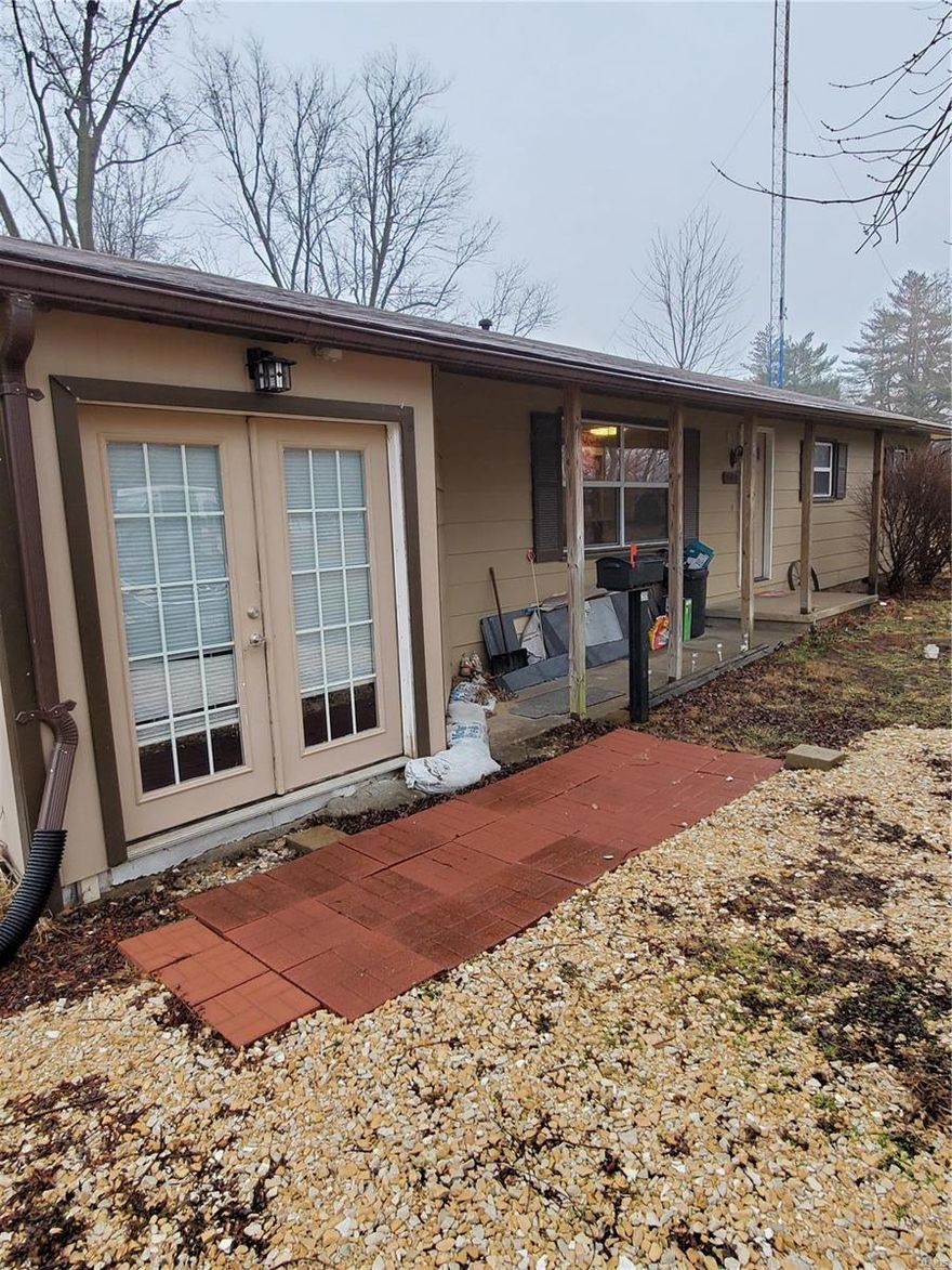 First timers! Downsizers! Landlords! Cute AS IS home has LOADS of potential! Large yard great for pets, games, activities, gardening, etc. This home is ready for some cosmetic make overs! Great Bonus Room is large and currently has a dry bar and its own window unit and electric fireplace (wiring will need to be verified before use). Use it for family night or as a separate office/work space with its own entrance! Sellers will not make any repairs or warranties. Some updates have been made, including furnace and a/c replaced 2 years ago. Refrigerator stays with home. Washer and dryer are negotiable! *Buyer will have to confirm square footage. **BACK-UP OFFERS WILL BE CONSIDERED**