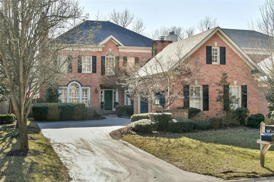 Elegant yet casual 4 bedroom, 4.5 bath home offers the best in main floor living located in a unique planned development of only 8 homes. The 2-story entry allows front to back views that open to gracious rooms with high ceilings and exquisite moldings and millwork throughout. Living room features a fireplace flanked by bookcases that could make a great office/den. The spacious formal dining room adjoins the great room with fireplace, wet bar, built in bookcases and a back wall of French doors and windows which open to the deck overlooking incredible views of natural beauty. The kitchen/hearth room area has classic cabinetry with marble countertops, breakfast room with bay, fireplace and laundry room. Main floor master has nice bath with shower and jet tub, his/her custom closets, limestone floors and French doors that walk out to deck. Upstairs is a sitting room, 3 nice bedrooms and two baths. Great finished LL with bar area, full bath, family room, exercise room and lots of storage.