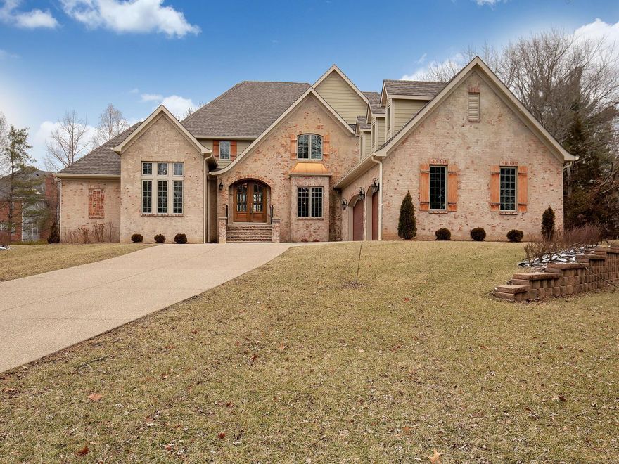 This Stately Home with handsome curb appeal is located in the sought after Bellecoeur Neighborhood!  This exceptional home features meticulously crafted and modern amenities, yet create a soothing ambiance of welcome and warmth!  This Luxury Home impresses at every turn!  Only 3.5 years old, you'll be "Wowed" with the architectural detailing found throughout, including stone walls, built-in book shelves, coffered ceilings with wood inlays, handscraped hardwood floors, and so much more!  Every feature was well-planned!  The stellar kitchen is fit for a master chef!  The Master Bedroom Retreat is complete with a sitting area, gas fireplace, Luxurious Master Bathroom, and so much more! This exquisite home sits on a beautiful, level, private .87 acre lot overlooking the salt-water pool. Boasting 5 spacious bedrooms, each with their own appointed bathroom.  5 gas fireplaces. The partially finished, walk-out lower level completes this incredible 5,274 sq. ft. home!