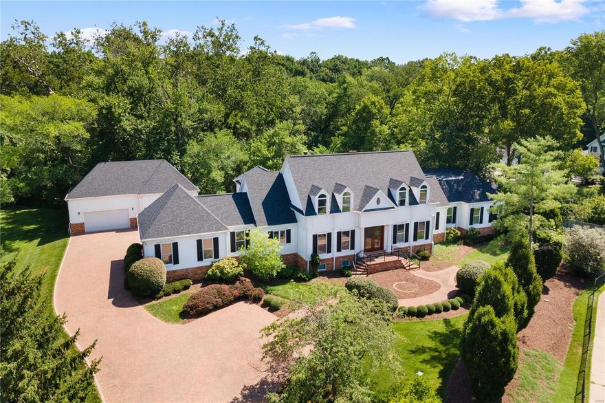 Gorgeous gated estate built in 1996, nestled on 3 private acres.  This stately 4 bed 5 bath features 10’ ceilings, a 6 car garage and a pool! Above sqft is 5,000! Freshly painted all through. The grand foyer has a large dining room connecting to the kitchen on the left and to the right is a beautiful study with Coffered Ceiling. Custom mill work throughout. Main floor primary wing offers a sitting room/office, 150 sqft closet, lux bath, marble counter tops. Garages have 15 ft ceilings. Dramatic great room, white kitchen with granite countertops, top of the line appliances. Lower level offers a wine cellar, wet bar, theatre room & pool table room, plus full bath & ample storage space. 2 private composite decks are perfect for entertaining around the private pool with outdoor lights. The gunite pebble surface pool offers a slide, fountain & waterfall. Your feet will keep cool while walking around the pool! Additional Rooms: Wine Cellar