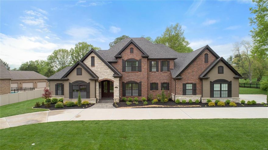 Unbelievable custom built 1.5 story by Berkeley Construction in wonderful Creve Coeur. Located on 1+ acre and featuring 4 Beds/6 Baths, this 4400+ square foot beauty is ready for a new owner. Only three years old, walking into this home is like seeing a brand new house. Features include: Custom Mahogany front door & grand 2 story Foyer; Study w/wood beamed ceiling and custom bookshelves; Great Room w/ box beamed ceiling, gas frplc & wall of windows; Kitchen w/custom cabinets, granite tops & center island w/breakfast bar, pantry, Butler's pantry & Brkfst. Rm. Beautiful Hearth Rm w/WB frplc; Powder Rm, Mud Rm & Laundry Rm.; Master Ste w/ His & Her closets, door to patio & luxury Bth w/heated marble flrs, His & Her vanities, walk-in shower & tub. 2nd Flr features a Loft, 3 Bds, all en-suite & convenient 2nd Flr Laundry. All this plus a circle driveway, oversized 3 car garage, central vacuum and gigantic level backyard with stamped concrete patio. Come see it now before its gone! Additional Rooms: Mud Room