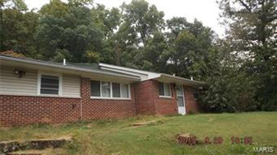 This spacious ranch home is a must see! It features 4 bedrooms, 2 bathrooms, stone fireplace, detached 2 car garage and so much more! Its also on 1.2 Acres. Hurry this will not last long at this great price. Seller completed a septic inspection, it is attached along with soil test. SpecialListingConditions: Foreclosure