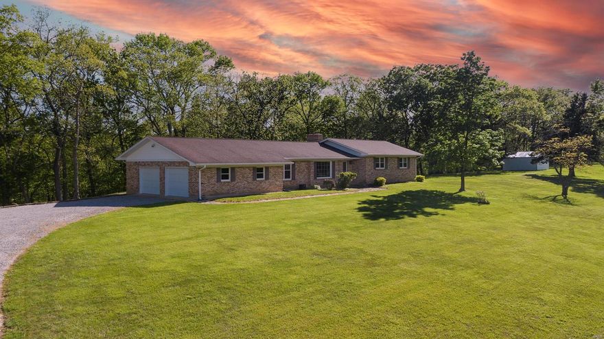 This 3 bedroom, 3 bath home sits on 21 acres of privacy and seclusion! Features of this home include: 3 bedrooms on the main level, main level laundry, main level master bedroom with master bath, large open living room, family room with fireplace, updated bathrooms throughout, oversized 2 car attached garage, 20x20 storage shed/workshop, pond, wet weather creek, large mature oaks and much more! Additional Rooms: Mud Room