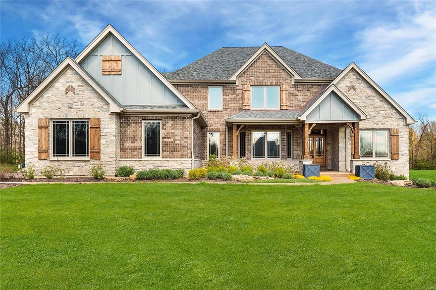 Stunning custom home in a gated neighborhood minutes away from downtown O'Fallon! 1 1/2 story home on 3.6 acres with oversized 4 car garage, on a cul-de-sac; 5000+ sq-ft of luxury. Custom front doors & beautiful sawn cut french oak floors greet you as you enter. The great room is open to the chef's kitchen with soaring ceilings, walk-in pantry, top of the line Jen Aire appliances, downdraft center island cook top, granite counters as well as a spacious breakfast room. The great room highlight is a see-thru fireplace to the of the amazing sunroom & walks out to firepit area; perfect for entertaining and overlooking the grounds. The main floor master bedroom & luxurious bath features a custom walk-in shower with 5 shower heads. The lower level, w/o has a fabulous theater room, rock wall/play area, wet bar/mini kitchen and additional spacious bedroom! 14 zone irrigation system, security system, prewired for pool/hot tub. Too many amenities to list - see attached feature sheet in MLS. Additional Rooms: Sun Room