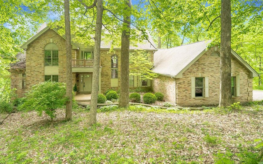 Nestled among the trees off a rustic lane is a home that welcomes you to a life where city noise becomes a memory! Serene 3 acre private world just minutes from Chesterfield Valley! With 5000+ finished sf, this Hardesty built 1.5sty atrium features 4+BRs, 4.5baths, 2 story great rm, 3 f/p, crown moulding, intimate & formal dining areas, library, main flr master suite w/ balcony, hearth rm, main flr laundry, fin LL w/ possible 5th BR, multi-level composite decks, oversized 3 car gar & the list goes on! Remodeled kitchen boasts quartz counters, plethora of custom cabs, tile backsplash, new lighting & it all glitters when complemented by glowing wood floor & wooded views that flow past the brkfst rm to the vaulted hearth rm. Updated master bath offers a dazzling spa-like design! Ensuite & 2BRs sharing J&J bath upstairs. Wet bar & rec rm in LL. Zoned HVAC. Central Vac. Security Sys. Pets may be considered. Rockwood Schools. Short-term rentals welcome!