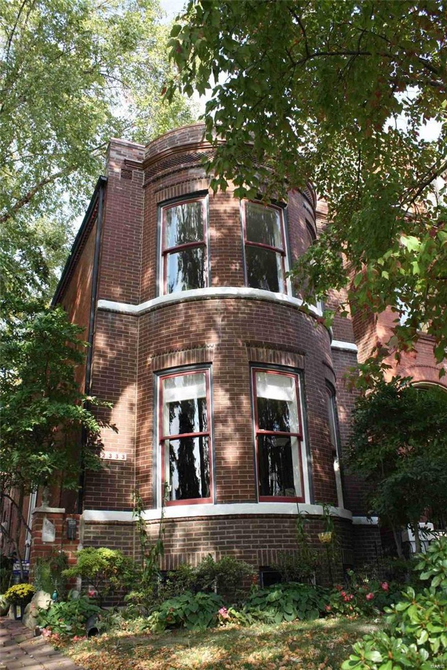 2333 South 12th Street is a unique property on a nice block in Historic Soulard.  This home features 2 bedrooms and 1 1/2 baths.  Great original millwork, a stylish, turreted façade with a gleaming new copper cornice, open floor plan and staircase can be found here.  It is an impressive balance of period architecture blended with a few, but not too many, contemporary accents.  Outdoors, you'll find beautiful landscaping and a brick patio for enjoyment and entertaining.  What's more, this property has a really cool alley house that is in good order.  It is currently unoccupied and used for storage.  It could be upgraded to make a beautiful extension to the main home, or guest house. Additional Rooms: Sun Room