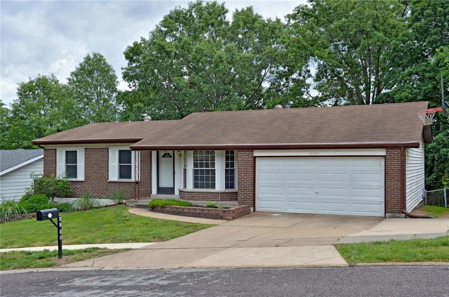 This walk-out ranch has been completely re-finished. Walk into the living room with gleaming 1/2" Solid Hardwood Bamboo Floors, vaulted ceiling and natural light from the bay window!! All new stainless steel appliances in the kitchen, nice eat-in breakfast area with separate dining. The full bath in the hallway serves guests and two main floor bedrooms, Lots of closet space in both!! The master bedroom suite has his and hers closets, a full bathroom with extra vanity space and a large closet. The basement boasts a large recreation area that is completely finished as well as another bedroom with a 1/2 bath. There is all new carpeting in all bedrooms and the lower level and 1/2" solid bamboo has been installed upon your entry. Enjoy your morning coffee on your Large back deck or private patio area. This place is turn-key, very nice.