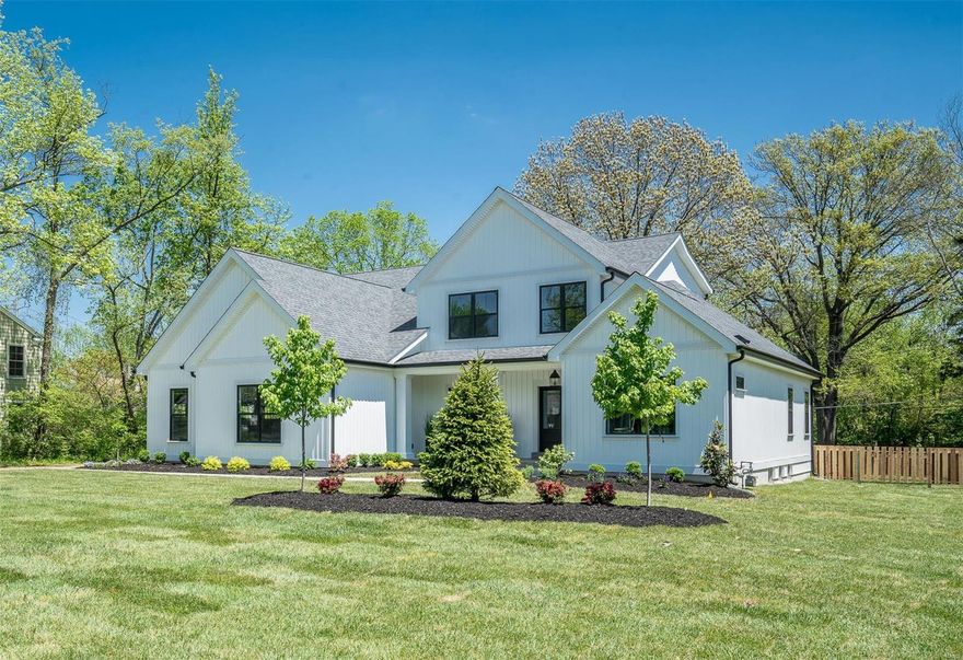 This stunning modern farmhouse is traditional without being fussy, classic without feeling stuffy, and comfortable in a way that makes you want to put your feet up and stay awhile. It's the perfect mix of tactile & tangible w luxury touches scattered throughout. Traditional creamy white woodwork including pine clad box-beam ceilings and board-n-batten wainscoting is partnered w a soft subdued paint palette, shiplap walls, and natural textures. Incredible unlacquered brass fixtures & stunning lighting were hand-selected for each room and are the jewels that set this home apart. Discover period details like a huge wall mount cast-iron laundry sink, a swoon-worthy black & white kitchen, and a classic master bath that you'll want to click & add to your Pinterest board. Other significant details include 2 laundry rooms, a 3 car side entry garage, 4 family rooms, main floor master, and a covered outdoor porch.  Go ahead, touch, feel, dream...and be sure to view the virtual tour of this home. Additional Rooms: Mud Room