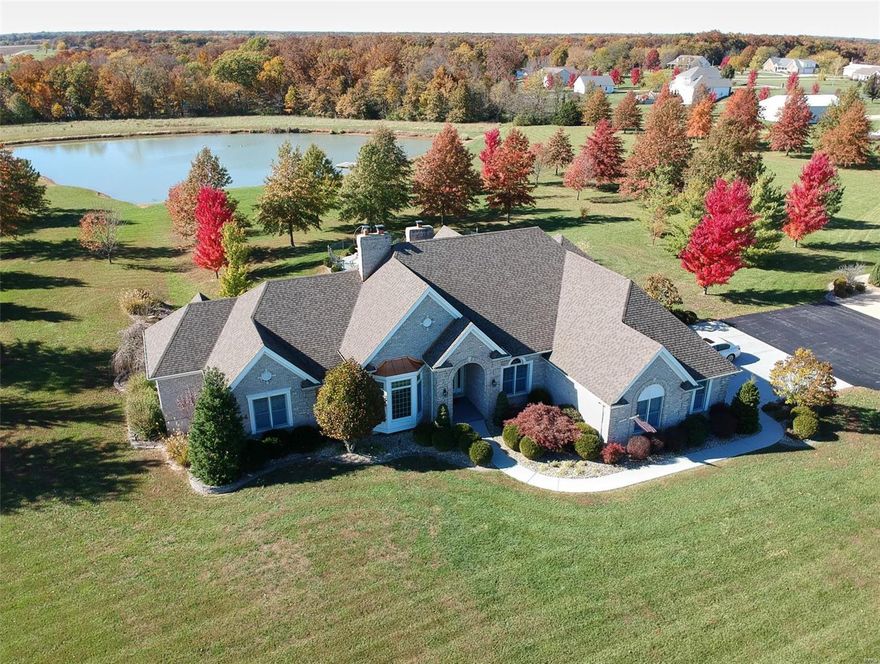 Get ready to fall in Love w/this Luxury Estate being offered for sale for the very first time! This Custom Built Full Brick w/o Ranch w/saltwater in ground pool, stocked lake, 8 car garage, & 18+ acres is Absolutely Stunning!  With complete attention to details this home boasts over 5000 sq ft of living space for all your family needs. Sparkling etched glass entry leads you to all points-whether it’s the Den, formal living rm, dining rm or into the custom kitchen &Hearth rm: each are amazing in themselves! Features such as hardwood flooring, granite counters, 3brick hearth full masonry fireplaces,crown molding, new lighting & new carpet. 3 more BRS on main level, each w/private bth & w/in closet. Your spacious master suite showcases a luxury spa bath w/2 entry custom shower, whirlpool tub, 2 private commode areas, & 2walk in closets! Amazing LL you need to see to believe with kitchen #2, workout rm massive recreation/family rm , 5th BR&bth. This is a beautiful Home,Lake,Pool, & land! Additional Rooms: Mud Room