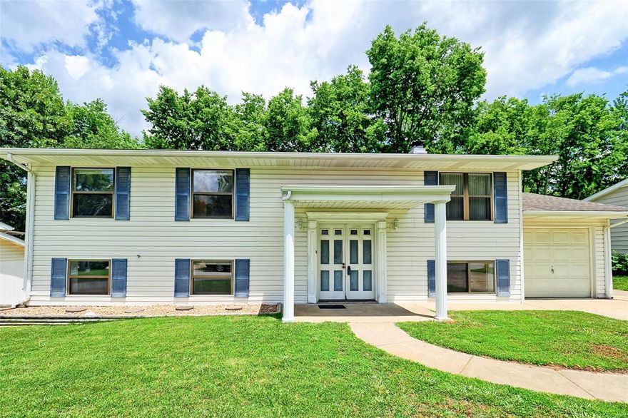 Check out this 5 bed 2 bath move in ready home!!!. Located in the quiet Mark Twain subdivision of St. Charles, this wonderful home backs to the trees and offers a fenced yard with plenty of room! Entering the home you will be greeted with hardwood floors, a spacious living room and plenty of natural light. Upstairs provides 3 bedrooms with a master, large kitchen with tons of counter space, formal dining room and access to the rear deck. Lower level offers 2 additional bedrooms, full bath and a LARGE living area with wood burning fireplace and walkout basement. Make an appointment today because a home in this price range won’t last long!!!