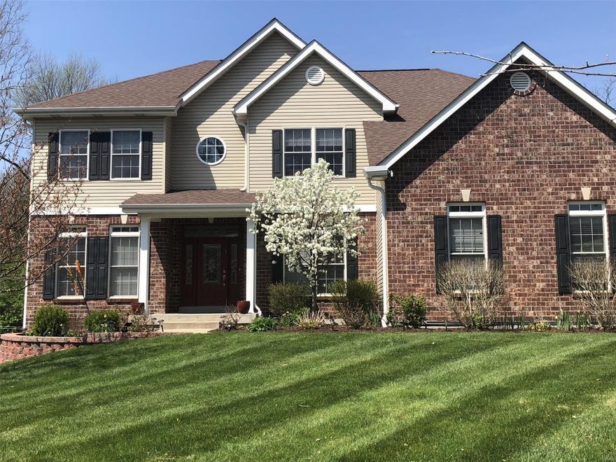 2 story perfect family home in popular Oak Estates neighborhood.  The first floor includes a gourmet kitchen with custom cabinets, granite counters, and an expansive breakfast room adjacent to the great room with a gas fireplace, dining room, and living room/office.  The second floor includes a master bedroom suite, 3 additional bedrooms, 2 additional full baths, and a possible 5th bedroom currently used as a loft.  Lower level finished by current owners in 2011 with 5th bedroom/workout room, full bathroom, wet bar with granite counters, large rec room.  Total livable space just over 5000 sq ft.  Large fenced level yard including side dog yard/vegetable garden area (.367 acres).  Ladue schools and walking distance to Old Bonhomme and Stacy Park. Additional Rooms: Mud Room