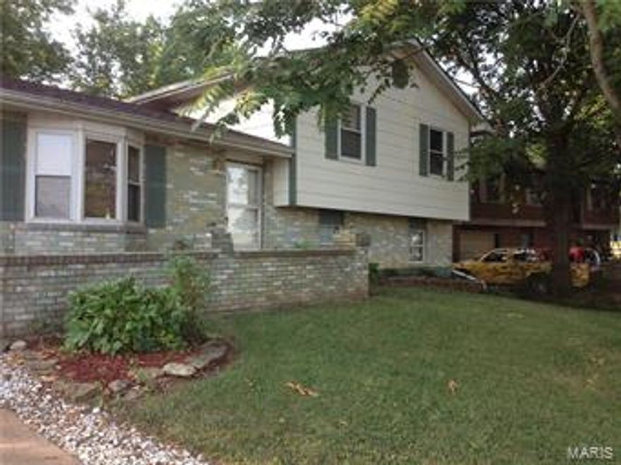Large family home with updated kitchen, landscaping already established, backyard patio with decorative pond & waterfall for relaxing evenings or those summer bar-b-qs.  Fenced yard with mature trees providing natural shading for the kiddos and pets.  Tri-level with 3 bedrooms and bath on upper level and additional bedroom or office in basement level.  Rec room with bar and outside door.  Laundry room and half bath combined. This home has only had one owner. Great family home needing just a few minor touches. Adorable backyard shed with electric. New breaker box. Home Occupancy Permit has been completed. Home is being sold as is. Pre-approved buyers only, please.