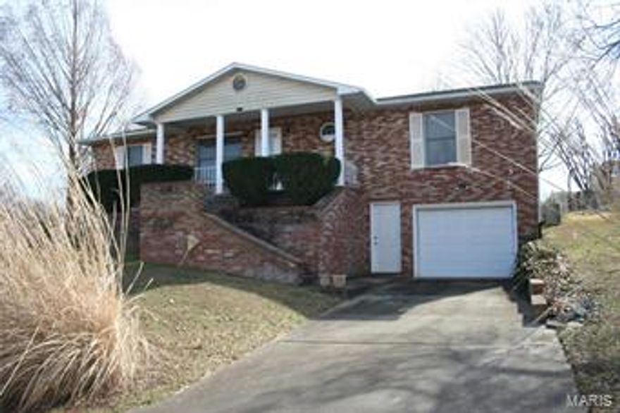 Beautiful home in Alexander Heights subdivision.  This house has 3 bedroom, 2 bath with an extra possible bedroom in the basement.  Also could be used as a game room, rec room, family room.  This home has a nice size family room and also a living room on the main floor.  The kitchen has custom cabinetry with pantry and also separate dining area.  There are two garages, one located in the front and the other tucked in around the side of the home.  This a must see and won't last long.  Very well maintained and ready to move in.