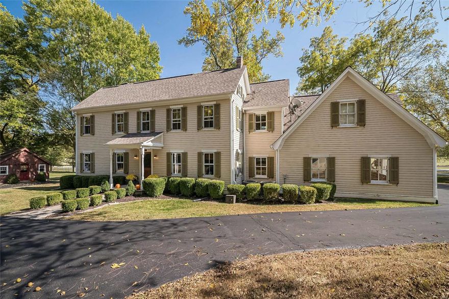 The historic charm of this home has been preserved, yet it's been carefully renovated with every convenience! Master suite with bubble jet tub and separate shower and walk in closet. 4 additional bedrooms, including a a suite perfect for extended family, complete with bedroom, full bath and family room accessed by separate stairway.  Kitchen has solid surface counters, gas range, microwave, center island with breakfast bar.  Beautiful library with a wall of bookshelves, and a great room with a stone wood burning fireplace. Original/restored hardwood flooring through most of main house and outbuilding. Over 3 acres of beautiful grounds, complete with outdoor fireplace, barbeque pit, limestone patio set in front of a running spring.Check out video for a wonderful event space!  Restored outbuilding has a game room, wet bar, half bath and vaulted ceilings! 4 car garage! Give yourself room to livelife in the country, just minutes from Chesterfield Valley! Rockwood schools! Additional Rooms: Mud Room