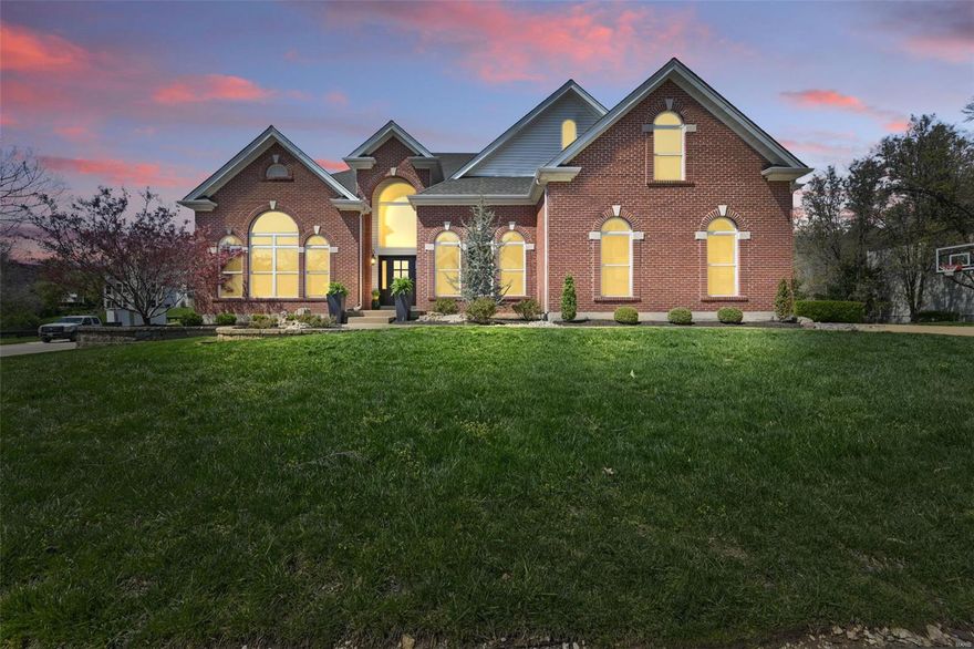 Luxury & comfort blend seamlessly in this stunning 7,000+ SqFt home on a beautifully landscaped lot with impeccable in-ground pool. Upon entry, you’re greeted with a 2 story foyer, stunning wood floors & grand staircase. Formal Study with custom wainscoting & millwork is timeless. Primary bedroom suite offers a custom bath, walk-in closet & private sitting room. Enjoy your gourmet kitchen with center island, b’fast bar, double ovens, built-in refrigerator, gas cooktop with pot filler, walk-in pantry & planning desk. Dining room comfortably seats 10 complete with millwork details & coffered ceiling. Stroll onto the large deck with serene view of a well manicured yard. 4 additional bedrooms, 2 baths, loft area upstairs with rear staircase leading to kitchen. Walkout finished lower level was made for entertaining! Rec. room, full kitchenette, family room, home gym, 6th bedroom & full bath. 3 car garage, inground irrigation & extensive improvements list.. Welcome home