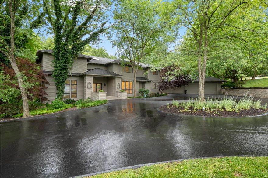 This architectural masterpiece resting on 3.5 acres is a true palace of privacy packed with pizzazz! Seller has invested over $350k in glorious upgrades since purchasing in 2018 - AND IT SHOWS! Windows galore capture nature’s beauty while attractive wood floors, soaring ceilings & Restoration Hardware lighting add to the home’s wow factor! Impressive floating staircase. Colossal dining room. Step down great room worthy of its name. Sophisticated library lined with built-in bookcases. Kitchen with marble island, JennAir SS appliances & breakfast room under greenhouse windows. Hearth room is sure to be a favorite family space. Front and rear staircases. Master suite with porcelain floor, custom WIC and spa-like bath. Walk-out LL has family/rec with new carpet, f/p, bar area & full bath. Party-perfect back yard with 3 decks overlooking the pool. Zoned HVAC, irrigation sys, water filtration sys, Nest, surround sound & more. Premier Chesterfield location in Parkway School District! Additional Rooms: Mud Room