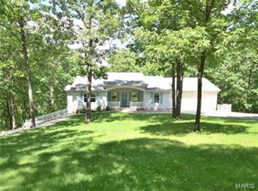 Welcome to this custom built 3 bed, 3.5 bath, ranch ideally set on 4+ acres! This gorgeous home offers an open floor plan and over sized rooms through out. The great room features a coffered ceiling and a full wall of windows looking out onto the private wooded backyard. The spacious kitchen features a large pantry, breakfast bar and custom mirrored back splash. Off of the kitchen is a beautiful screened-in porch with vaulted ceilings and an open deck with composite deck boards and stairs to below.  The master suite boasts a separate jetted tub, walk in shower and double bowl vanity with a stack of drawers. The finished walk out lower level is complete with an expansive family room, full bath and additional bedroom. Furthermore this home features 2x6 exterior walls, thermostat regulated attic fans in both the house and garage, water softener, over-sized insulated and dry walled garage and additional storage beneath the garage. Schedule your private showing before it's too late!