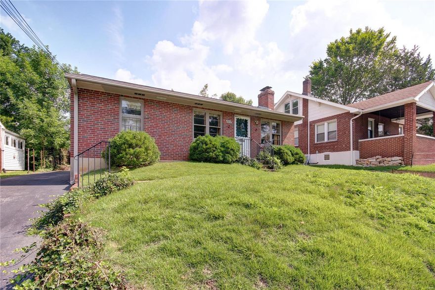 Don't miss out on this great opportunity in the heart of Brentwood! This spacious brick three bedroom, one bathroom bungalow is moments from Brentwood Promenade and Square, the Rec Center, and all of the shopping and restaurants on Manchester and Brentwood Blvd., plus steps from award-winning Brentwood Schools. Enter to the bright living/dining room area with a gas fireplace and hardwoods that run throughout the home. The kitchen features great retro light fixtures and opens to a family room addition complete with built-in shelves and cabinets, bay window, and beamed ceiling. Off the family room is a bedroom and screened in patio, perfect for enjoying the summer weather! Two more bedrooms and a bathroom complete the space. You'll have plenty of room for storage in the unfinished basement with more built-ins. The backyard features a detached one-car garage and paver patio. This one is just waiting for your TLC! Home to be sold in as-is condition, seller to do no inspections or repairs.