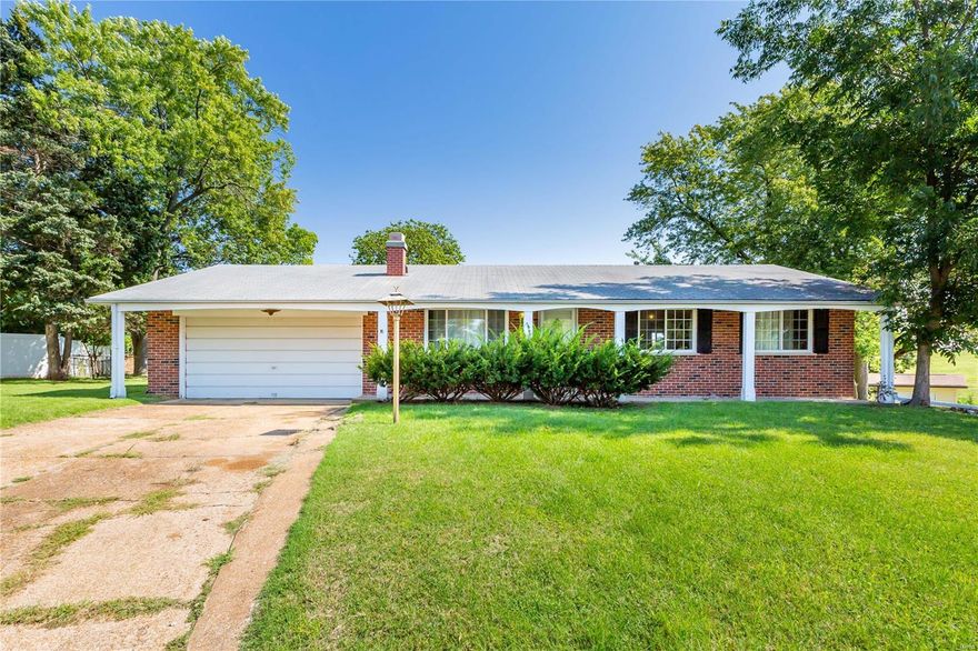 This adorable ranch is move in ready and waiting for you.  Put your special finishing touches on it to make it your ideal home.  You can snuggle up this winter in the cozy living room that includes a wood burning fireplace and hardwood floors.  This home is 3 bedrooms and 1.5 baths on the main level; a nicely designed floor plan.  This home also offers an eat in kitchen with tiled floors, gleaming hardwoods as you enter, a flat - fenced- in yard with TWO patios ready for family BBQs and relaxation, plus a covered back porch.  This home is neatly situated on a cul de sac offering great privacy.  The basement is a finished walk out with another full bath for family convenience.  This is in the Pattonville school district and is conveniently located to lots of shopping, restaurants and entertainment.  Priced to sell!  Great value!