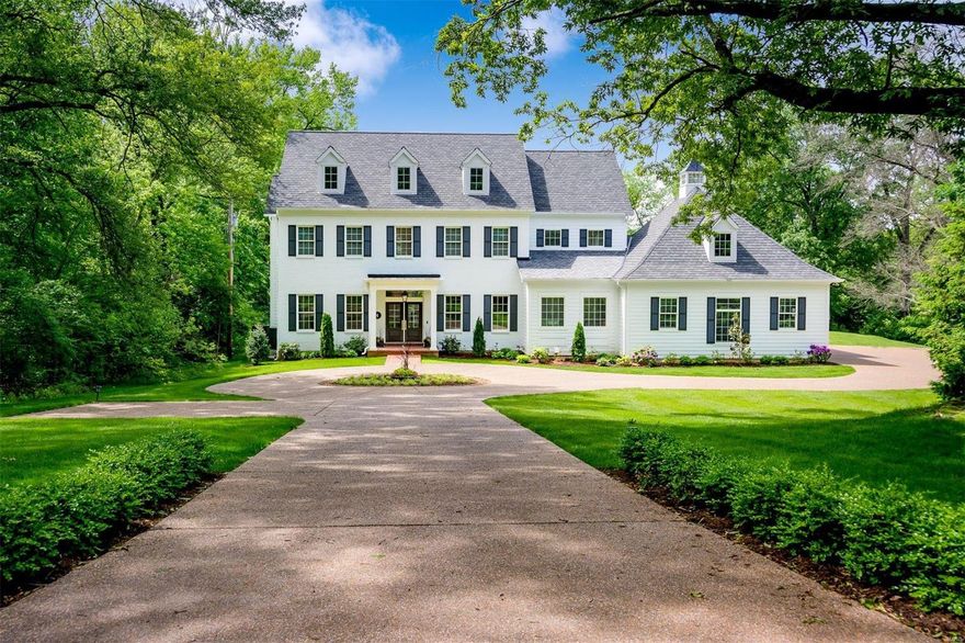 Classic style with all the luxuries and features of new construction. Prime location in the Ladue school district just a short walking distance to Spoede elementary school. This one year old home was meticulously crafted by The Manlin Company Custom Homes for it’s owner. This exceptional home sits nestled on a private cul-de-sac on over an acre home site that backs to trees. Enjoy this wooded privacy and large yard on a wonderful covered porch that includes a fireplace seating area and separate dining area. As you enter the house and into the serene, light filled space with 10 ft ceilings, stunning hardwood floors, a wine cellar and more you’ll
undoubtedly appreciate the workmanship and attention to every detail. High end appliances including a built in SubZero refrigerator, Wolf range and ovens compliment a kitchen for a true gourmet. Main floor and second floor laundry rooms and a finished lower level. Everything you need and much more.