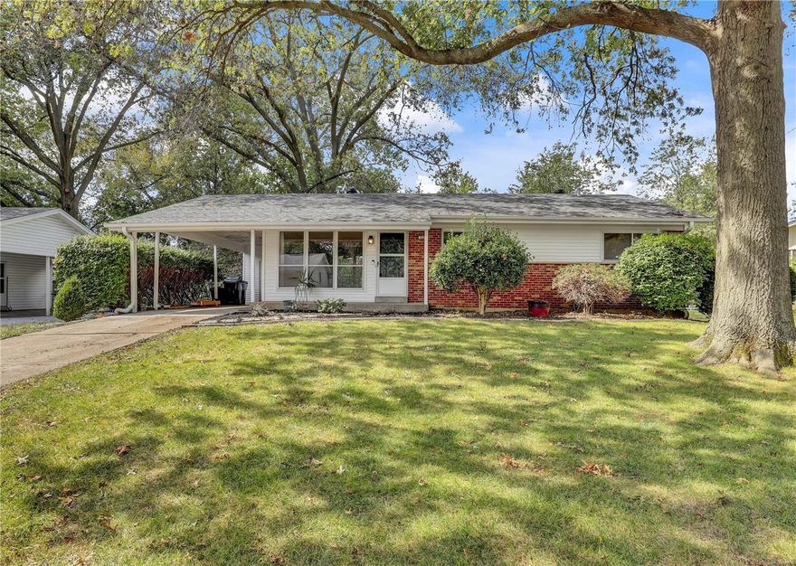 Charming ranch home with 3 nice sized bedrooms and 2 updated bathrooms, including a master suite. Original hardwood floors throughout the main level.  Upon entering you will find the open, spacious living and adjoining dining room. The eat-in kitchen features white cabinets, new countertops and new sink, all the appliances and leads out to a concrete patio overlooking the large fenced-in backyard with beautiful flowering trees. Both baths have been completely remodeled.  The lower level is excellent for entertaining; complete with a bar area and large rec room. The carport provides great covered parking and is complete with a storage shed.  Roof and furnace are 5 years young.  This home has truly been cared for and well-maintained and is perfectly located just steps from shops, restaurants, grocery stores, hospitals, parks, and more.