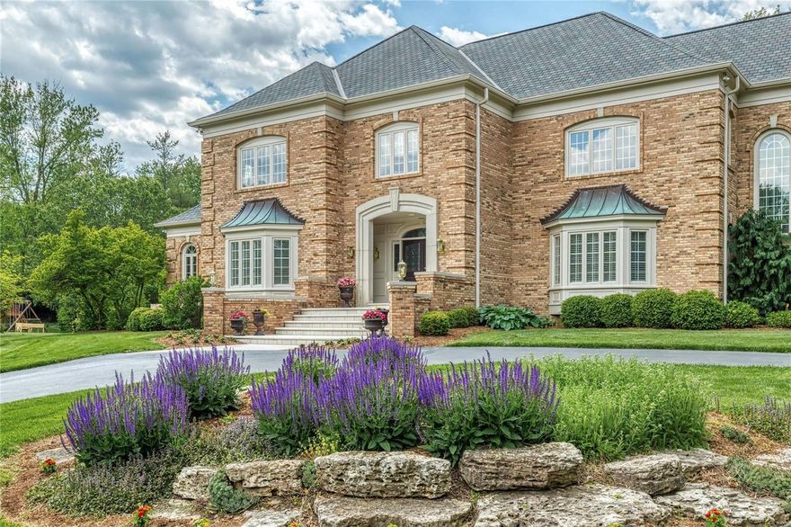 Magnificent European-styled Estate home with over 10,000 sq ft of living space. Stunning 2-sty foyer with gallery landing & dramatic floating staircase opens to elegant dining room with leaded glass doors & custom built-ins, private study, coffered living room & library-paneled family room with brick fireplace flanked by bookcases & wet bar. Exceptionally large kitchen featuring glazed white cabinetry, quartzite countertops & commercial grade appliances adjoins light-filled breakfast room with skylights & built-in buffet. The master bedroom suite offers an appealing retreat with customized storage cabinets, luxury bath with jetted tub & adjacent study. 5 Additional bedrooms, 3 with ensuite baths & 2 with Jack n’ Jill bath, complete the 2nd floor living quarters. Lower Level entertainment space includes recreation room, family room, flex room, guest suite, pool bath & 2 changing rooms. French doors open to outdoor living area with patio, resort style pool with spa & lighted sport court. Additional Rooms: Sun Room