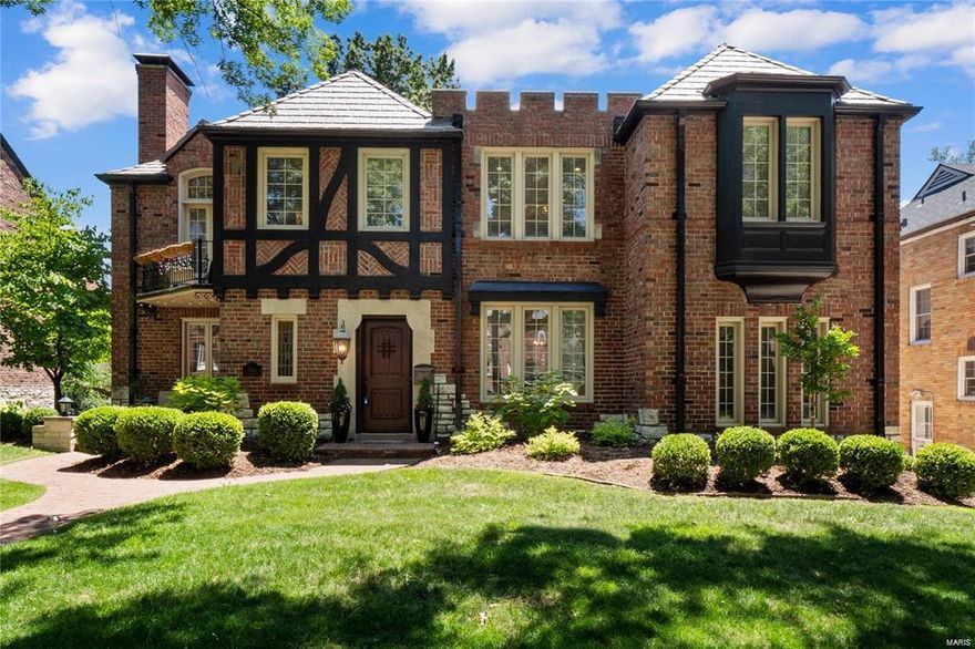 Welcome to your stunning Tudor style home located in the walkable urban Moorlands neighborhood in Clayton! This home even features mother-in-law quarters with a private en-suite. A grand foyer welcomes you into the spacious and bright first level complete with a large chef’s kitchen, breakfast nook,  wet bar. The master suite is a private retreat with a fireplace, private balcony, sitting area, oversized walk-in closet and two chandeliers. The lavish master bath boasts his and hers sinks, soaking tub, walk-in steam shower, vanity and ample storage space. This home also includes both main and second floor laundry, a finished basement, screened-in sun porch and a two car attached garage and extra parking pad. Walk out to the private New York style maintenance free backyard, perfect for entertaining. Incredible value for Clayton! Enjoy the highly walkable area steps from Clayton’s dining and restaurant district, parks, and award winning Clayton Schools.
