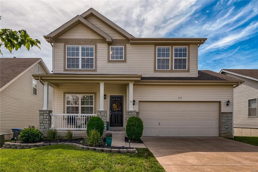 A MUST SEE! Exceptional 4 Bedroom, 2-Story home with approximately 2,000 sq ft of living space. Features an open floor plan with 9' ceilings and beautiful laminate wood flooring flowing through the first floor. The fabulous Kitchen/Breakfast Room combo features 42" cabinets with custom hardware, stainless steel appliances (dishwasher, gas range/oven, and microwave), under cabinet lighting, planning desk and customized pantry. Master Bedroom suite with walk in closet & Bath with double sink vanity and separate tub & shower.  Main floor Powder & Laundry room. New roof recently installed. Enjoy your morning coffee from the new deck built with composite material and accessible from the breakfast room and backing to the large privately wooded lot. After an afternoon at the neighborhood pool, enjoy grilling or bonfires from the sprawling covered patio off the walk out basement - the perfect setting for entertaining.  Conveniently located just minutes from shopping, dining other destinations!