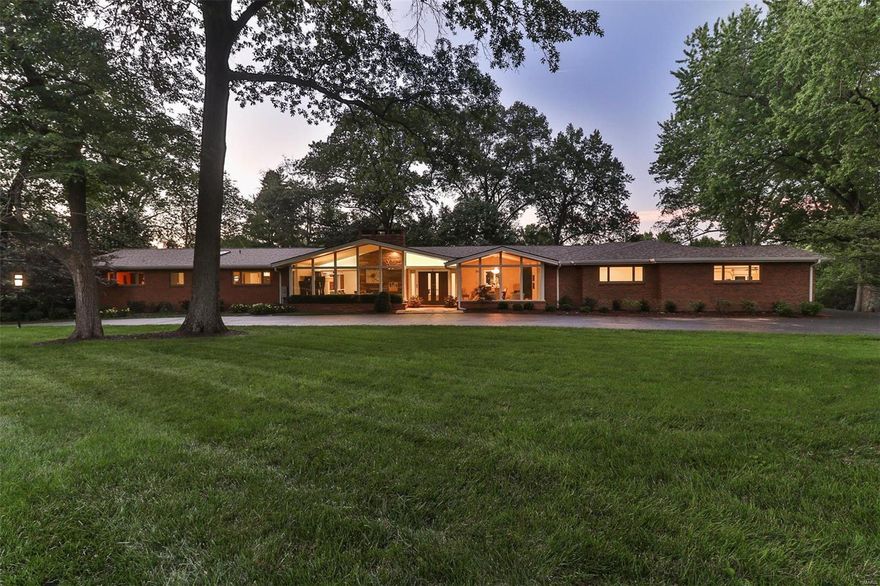 A mid-century ranch beautifully transitioned into a stunning transitional/modern styled home w 1.5 acres on a private street w/in walking distance to Plaza Frontenac & Schneithorst Village. Brand new (Jan 2018) state of the art gourmet kitchen.  This home features an open floor plan w vaulted ceilings, terrazzo floors & has a total of 8 skylights, 4 fireplaces, wood floors, & a brand new large main floor addition completed in 2018.  The addition includes: vaulted master bedroom w marble fireplace, a custom his/hers walk-in closet, heated marble floors in a double vanity master bath w free standing tub & walk-in marble shower, guest half bath, office nook & large custom mudroom w a first floor laundry.  This home includes an additional 2200 sq ft of living space on the lower level to total over 6000 sq ft of living space in the home.  A walk out basement w full kitchen, bedroom, exercise room, bathroom & rec room walks out to a salt water pool, spa, fire pit & putting green. Additional Rooms: Mud Room