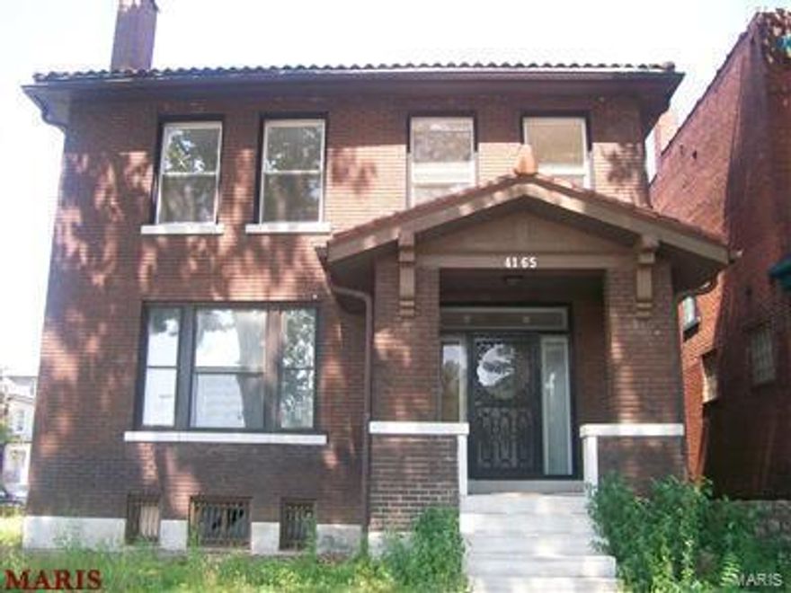 Fantastic buy for anyone at this price!!!! All Brick 2 Story spacious 4 bedrooms home, corner lot. Historic millwork and hardwood flooring throughout the home. 
Walk into the large entry Foyer that has the ceramic tile, staircase, Living Room w/Fireplace, leads to Formal Dining Room. The kitchen is eat in and has plenty of cabinets & counter space. Going to the upstairs you have the large and spacious  Bedrooms.   Hurry to see this rare opportunity!! Home features over 2,000 square feet of living area, full basement, porch, and level lot. 1 car brick garage.  Located in the O'Fallon neighborhood of St. Louis City and is minutes away from O'Fallon Park Rec Center, Fairgrounds Park, Highway 70, and a short drive to Downtown St. Louis. This home is being sold in As-Is condition.  Seller to make no repairs are provided any inspection. SpecialListingConditions: Foreclosure