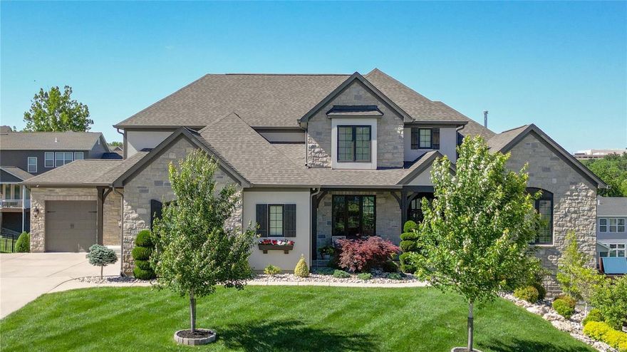 Welcome to your dream home in Des Peres! This exquisite estate offers unparalleled luxury with 4 spacious beds & 4.5 baths. Designed for comfort & sophistication, it’s an ideal sanctuary for families & entertainers alike. The main floor master suite boasts a generous walk-in closet & spa-like ensuite bath. The custom kitchen features top-of-the-line appliances, ample cabinetry, & large center island, perfect for culinary enthusiasts. The expansive greatroom offers a warm & inviting space for relaxation & entertainment. Cozy up in the hearth room with a charming fireplace, ideal for family moments. A private office provides a quiet, productive environment. Three additional spacious bedrooms, each with beautifully appointed bathrooms, ensure comfort for all. The landscaped grounds offer a serene retreat for outdoor entertaining. Located in a desirable Des Peres neighborhood, enjoy easy access to top-rated schools, shopping, dining, & recreational amenities.