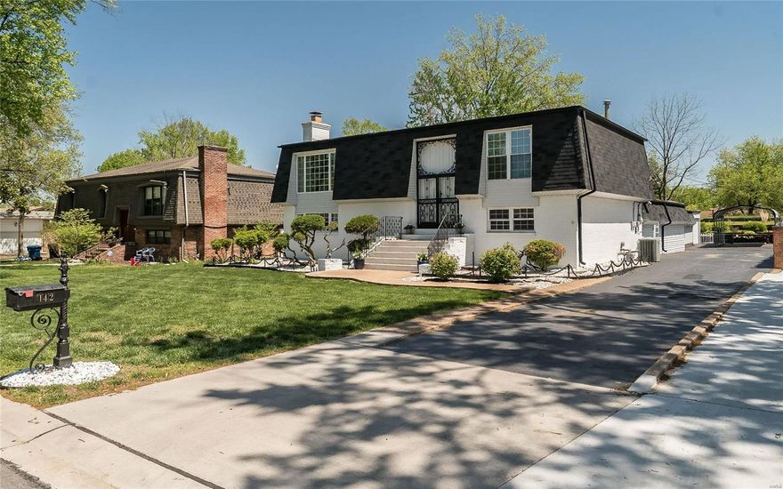 Updates GALORE&WALKING Distance to LINDBERGH HS*CHEF'S DREAM Kitchen boasts CUSTOM 42in cabinets w/DOVETAILED Drawers*Soft Close*LAZY Susan w/TURN tables*DEEP Stainless SINK*DBL trash CABINET*GAS Dbl OVEN range w/CONVECTION*30in PYRAMID Range HOOD*SHARP 24in Microwave DRAWER in Island*BOSCH 3 rack DISHWASHER*CUSTOM BARN  Window Doors*19in WINE Cooler in ISLAND*QUARTZITE Honed COUNTERTOPS*Subway TILE backsplash*CUSTOM Wood Floating shelving*PANTRY w/ROLLOUTS*center ISLAND(78inx84in) w/SEATING**WIDE Plank WHITE OAK Engineered Wood Floors*WOOL carpet on STAIRS*ORIGINAL IRON Spindle STAIRWAY*BRICK FIREPLACE*New LIGHTING&FANS*ORIGINAL TERRAZZO flooring in Main Level Bath&MASTER BDRM*MF MASTER Bdrm*MFL*KEYLESS Entry on GARAGE entry&BACK door*2 CAR Oversized REAR Entry garage*LARGE FAMILY rm w/WOODBURNING Fireplace ready for finishing touches&Door to COVERED Patio*CUSTOM Drapes in GR*NEW Carpet UPSTAIRS w/2 GENEROUS size BDRMS, LOFT SPACE w/closets&FULL BATH.2 SHEDS&CARPORT PARKING*Large LOT!