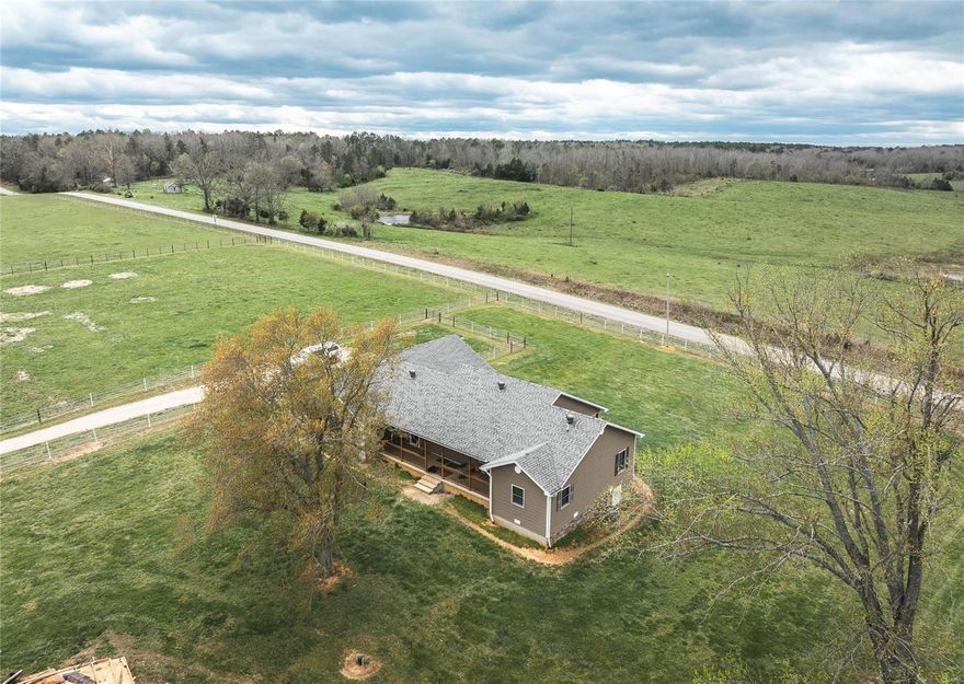 This Shannon County, Missouri, property offers a 1980 sqft home. Custom cabinets and flooring! Stone-finished exterior nice land. A sprawling 120 acres the property boasting 7 fields, all meticulously managed with rotational grazing techniques. Perimeter fencing of the landscape and Water features abound, three self-watering systems and three ponds on the property. Hurricane Creek enhances the natural allure, of deer and turkey, For the practical-minded, a heavy-duty machine shed offers ample storage for equipment, the milking barn has a concrete floor also could be a storm shelter. A horse barn, boasting ten spacious stalls and a hay barn provides convenient storage for feed and supplies. Bordering the renowned Mark Twain National Forest, the property has access to. Hwy 60 just minutes away. Located a mere two hours from bustling Springfield and Poplar Bluff, Willow Springs and Mountain View, Shannon County promises a lifestyle of tranquility, adventure, and endless possibilities.