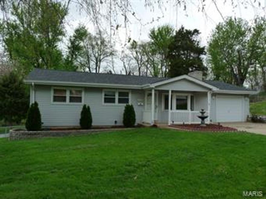 This 3 bedroom, 2 full bath ranch home has been loved by this seller!  Updated HVAC, windows, hardwood floors, 30 year architectural shingled roof & a yard you will have to see to believe!  Low maintenance vinyl siding & attached garage.  Large living room with hardwood flooring & bay window, updated kitchen with crisp white cabinets is open to breakfast room with large picture window overlooking lush backyard with mature trees.  Three bedrooms & a full bath complete the main level.  But the walkout lower level is finished with a rec area, exercise room/sleeping area & a full bath.  The yard is fenced with a covered patio and paver patio extension for great outdoor entertaining space!  Seller says it’s common to see deer behind his yard.  To sweeten the deal—seller is offering unique HMS home warranty!